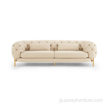 本革のソファは、ボタン付きのリビングルームの贅沢をセットします